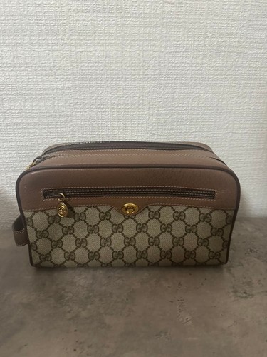 Gucci supreme clutch - gg,